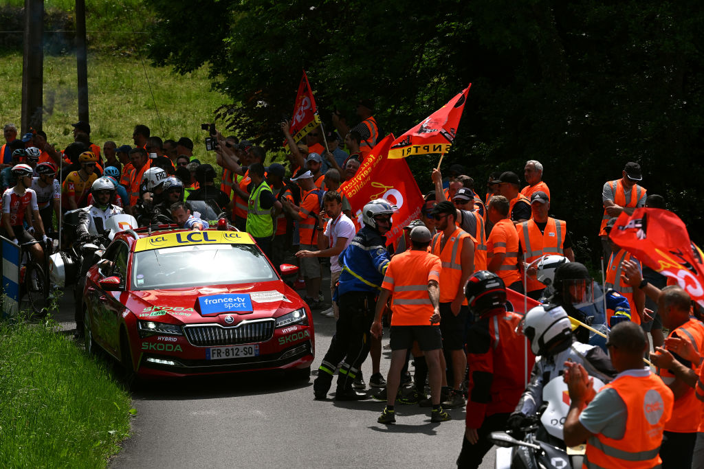 Stage 3 of the 2023 Criterium du Dauphine stopped briefly by an on-road protest
