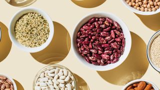 Beans and lentils in separate china bowls