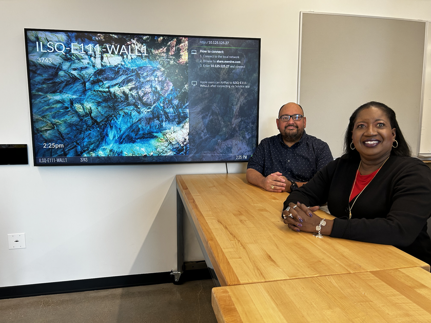 Regina Greenwood, University Audiovisual Services IT director; Carlos Lucio, associate director of Technology Services for the University Audiovisual Services Department