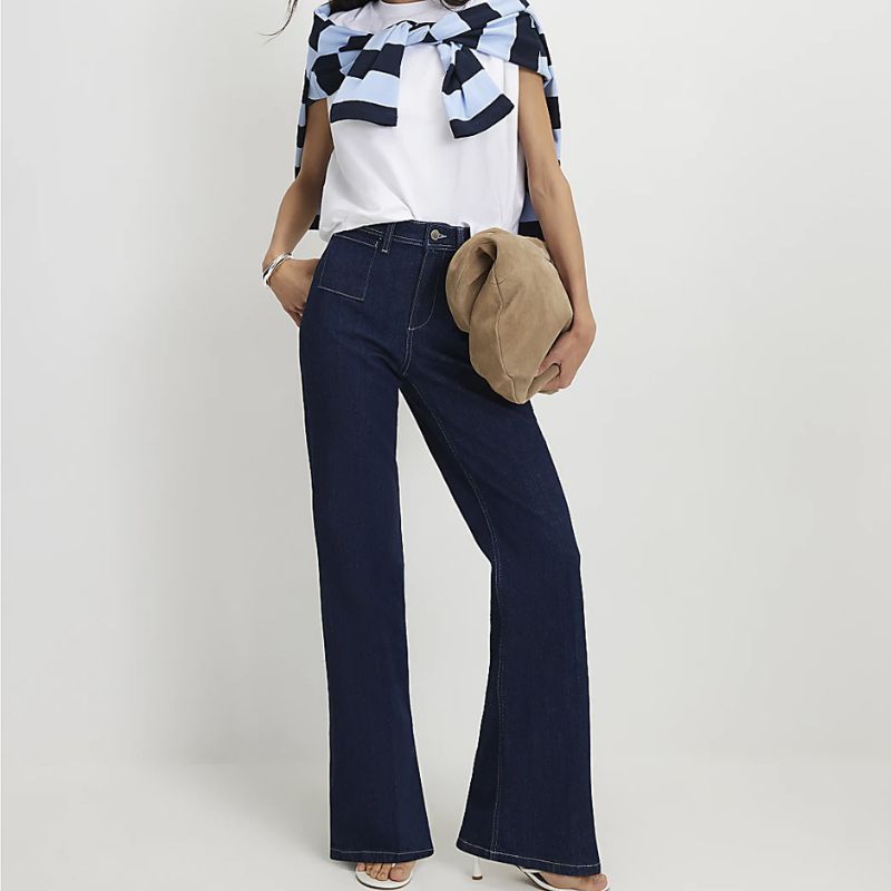 Blue High Waisted Relaxed Flare Jeans on model