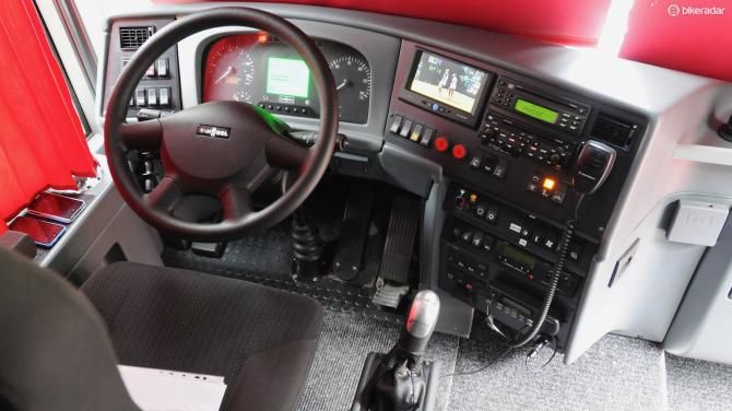 Driver Rompion's workplace for many thousands of miles per year has a TV screen that will show the chosen TV output until a gear is selected, when it reverts to showing Sat Nav directions or the reversing camera view