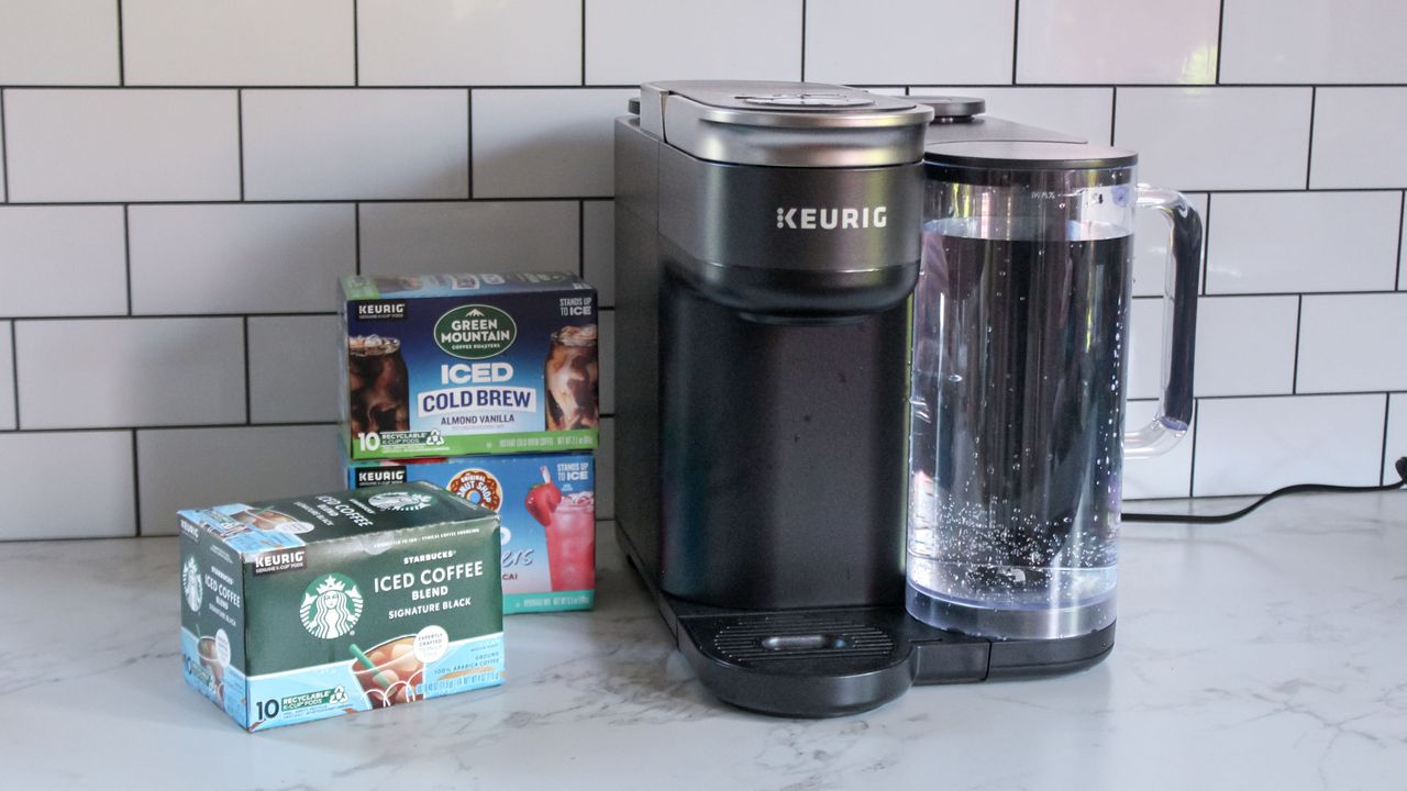 Keurig K-Brew+Chill next to two boxes of pods
