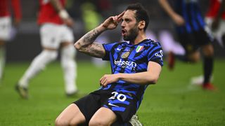 Hakan Calhanoglu of FC Internazionale celebrates after scoring his team's equalizing goal during the Coppa Italia Semi Final match between AC Milan and FC Internazionale at Stadio Giuseppe Meazza on April 02, 2025 in Milan, Italy. 