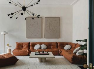 living room ideas brown togo sofa white walls