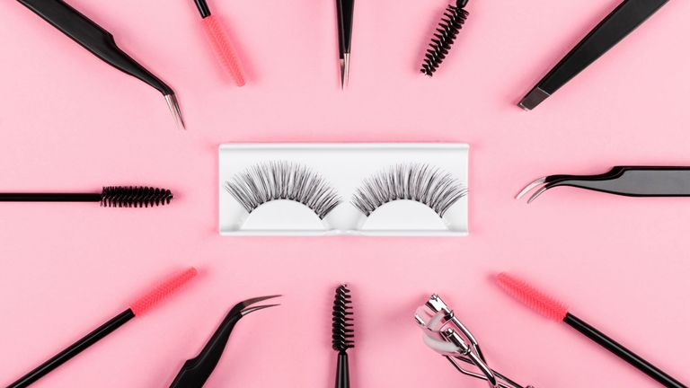 False lashes, tweezers and lash comb