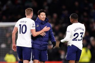 Tottenham Hotspur’s Harry Kane greets Son Heung-min and Steven Bergwijn after the final whistle during the Premier League match at the Tottenham Hotspur Stadium, London. Picture date: Thursday December 2, 2021