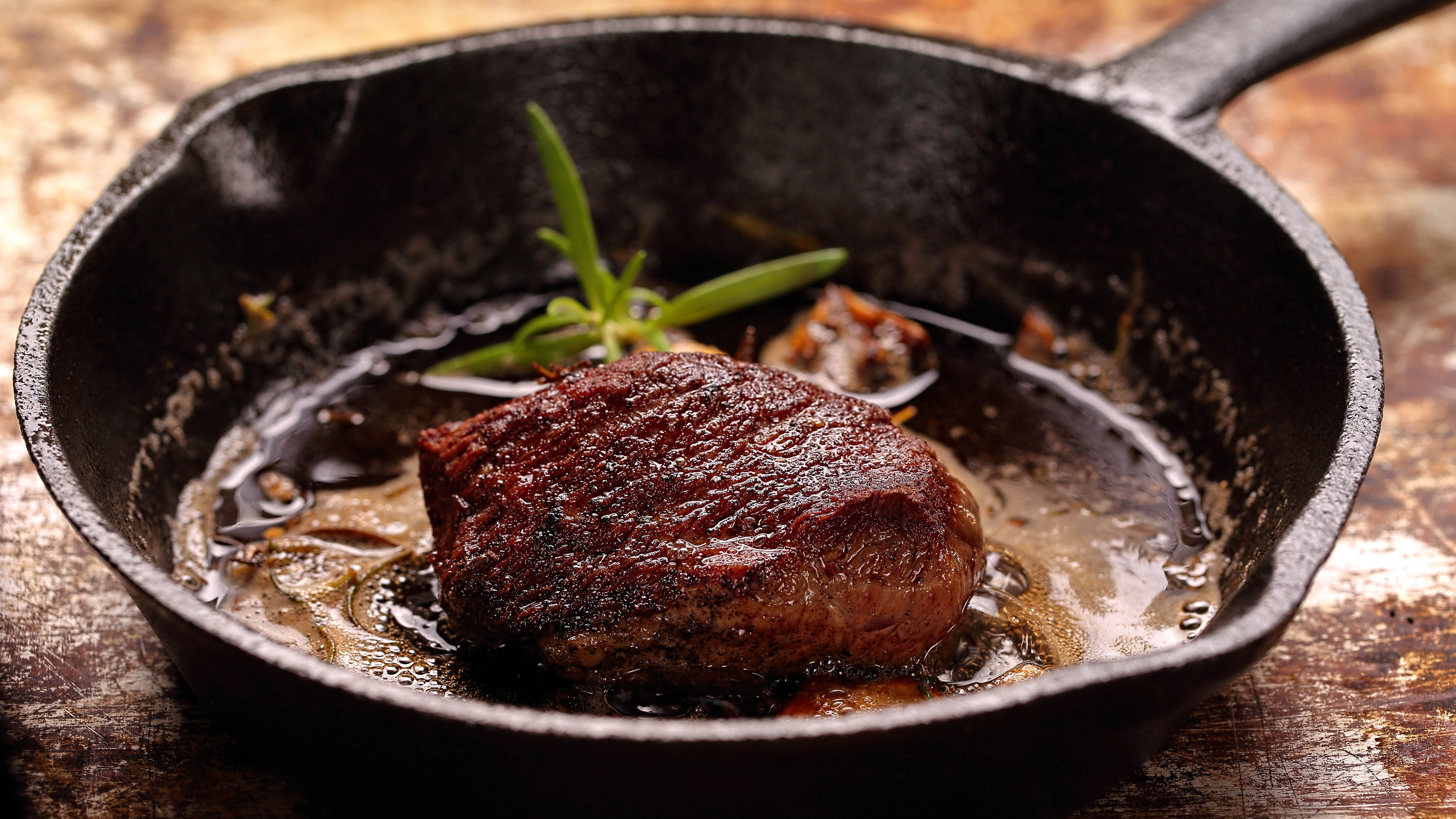 Here's Your Ultimate Guide to Cast Iron Pans (Featuring Steak