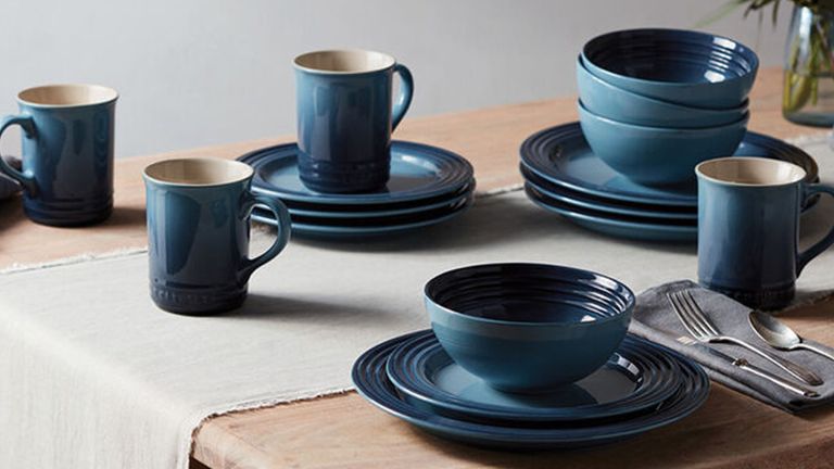 Lifestyle shot of table laid with Le Creuset dinnerware 