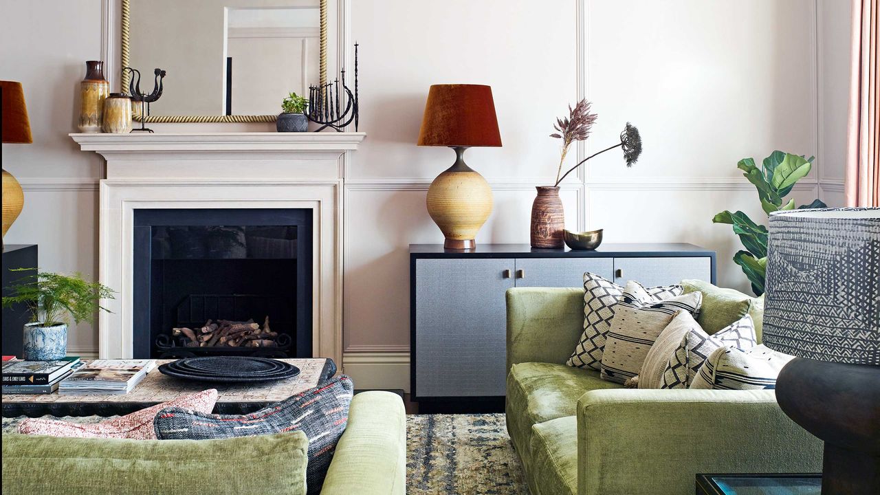 living room with armchair and fireplace