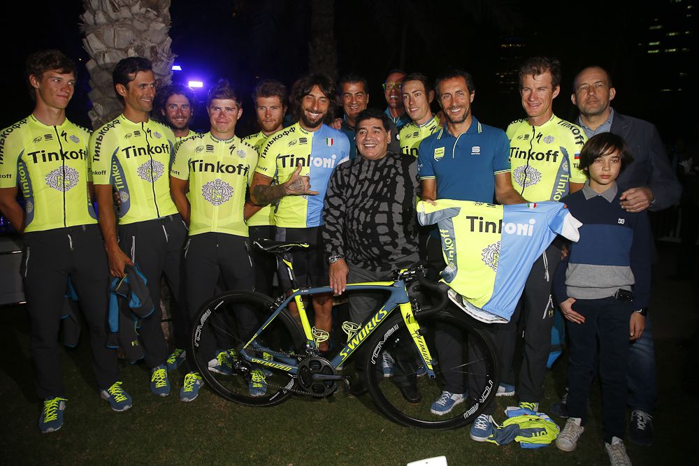Tinkoff team present former footballer Diego Armando Maradona with a jersey and bike.