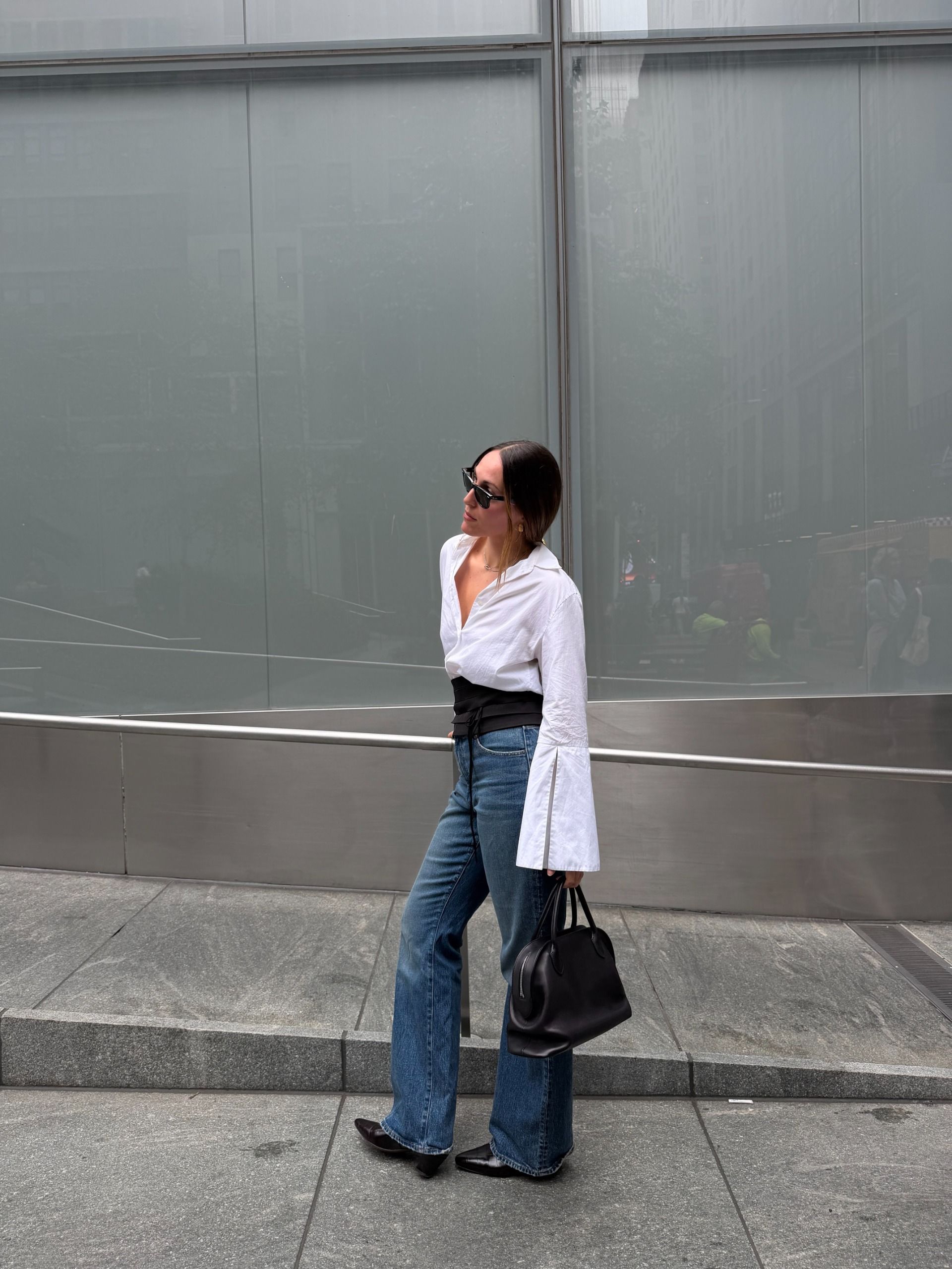 an outfit photo of senior fashion editor Anna LaPlaca wearing the cummerbund trend for fall 2026