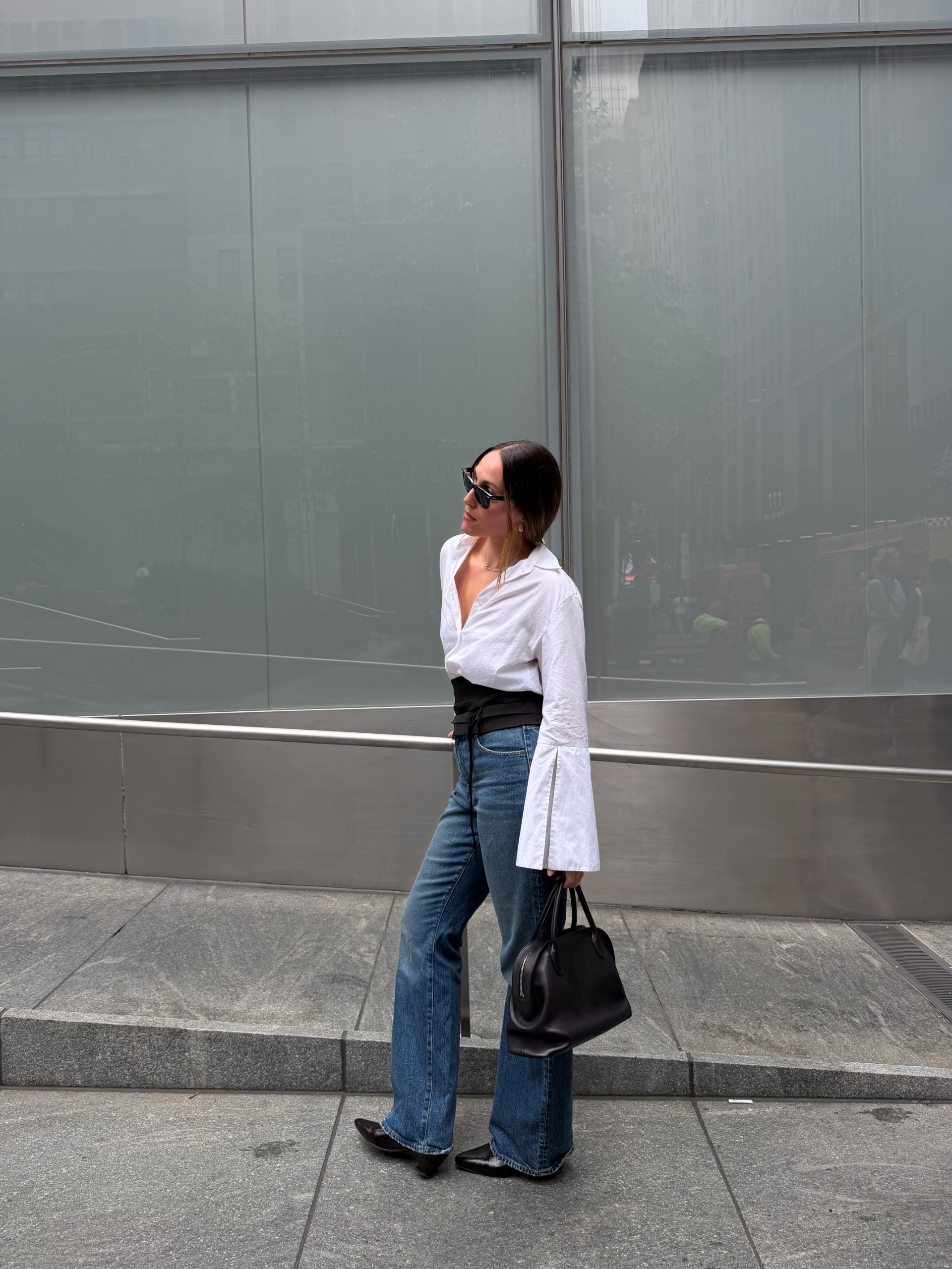 Senior fashion editor Anna LaPlaca wearing the cummerbund trend for fall 2026.