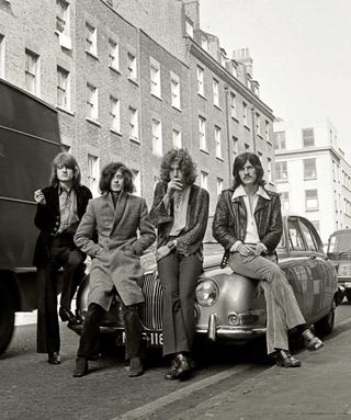 Led Zeppeklin leaning on a car in a London street, 1968