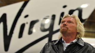 Sir Richard Branson speaks to AFP during an interview before the official unveiling of Virgin Galactic's SpaceShipTwo, the world's first commercial manned spacecraft, at the Mojave Air and Space Port in Mojave, California on December 7, 2009. 