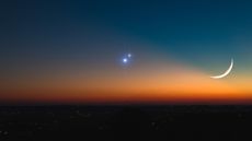 A planetary conjunction alongside a crescent moon
