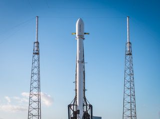 A SpaceX Falcon 9 rocket carrying the secret Zuma spacecraft stands atop Space Launch Complex 40 at Cape Canaveral Air Force Station in Florida ahead of its planned launch on Jan. 7, 2018.