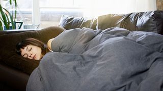 Woman sleeping on the couch