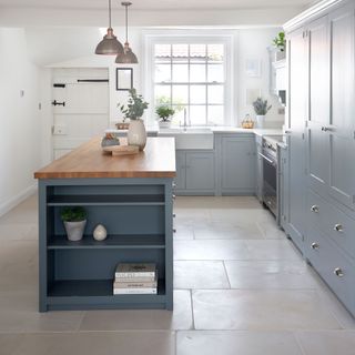 kitchen porcelain flooring and blue cabinets