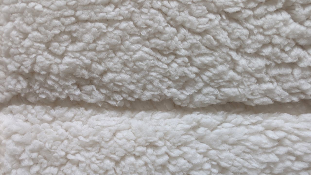 The fleecy Dunelm Teddy Mattress Topper up close