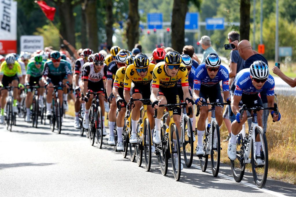 BREDA NETHERLANDS AUGUST 21 LR Edoardo Affini of Italy Rohan Dennis of Australia and Team Jumbo Visma Xandro Meurisse of Belgium and Team AlpecinDeceuninck and the peloton during the 77th Tour of Spain 2022 Stage 3 a 1932km stage from Breda to Breda LaVuelta22 WorldTour on August 21 2022 in Breda Netherlands Photo by Bas CzerwinskiGetty Images