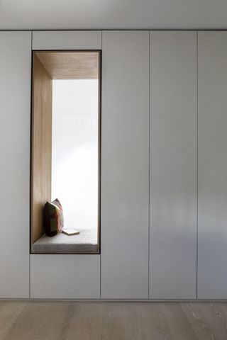 small apartment organization with floor-to-ceiling built-in storage by Gunter & Co