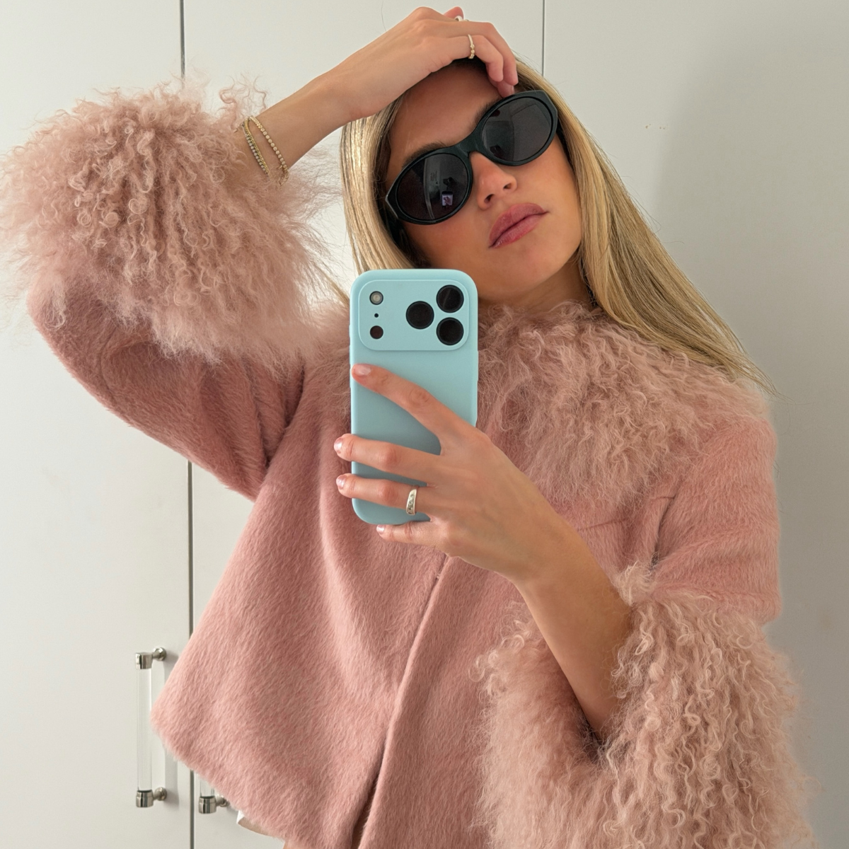 An image of a woman wearing non black fall jacket 2026