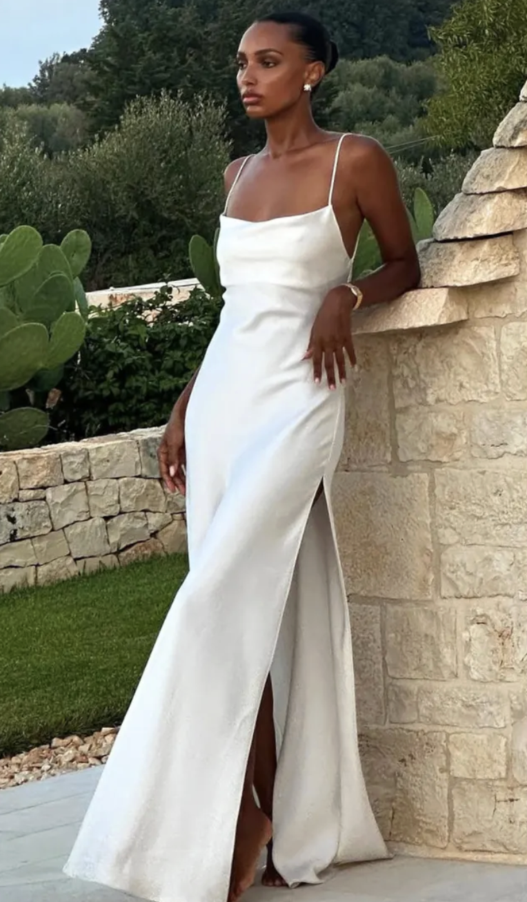 @jastookes wears white wedding dress