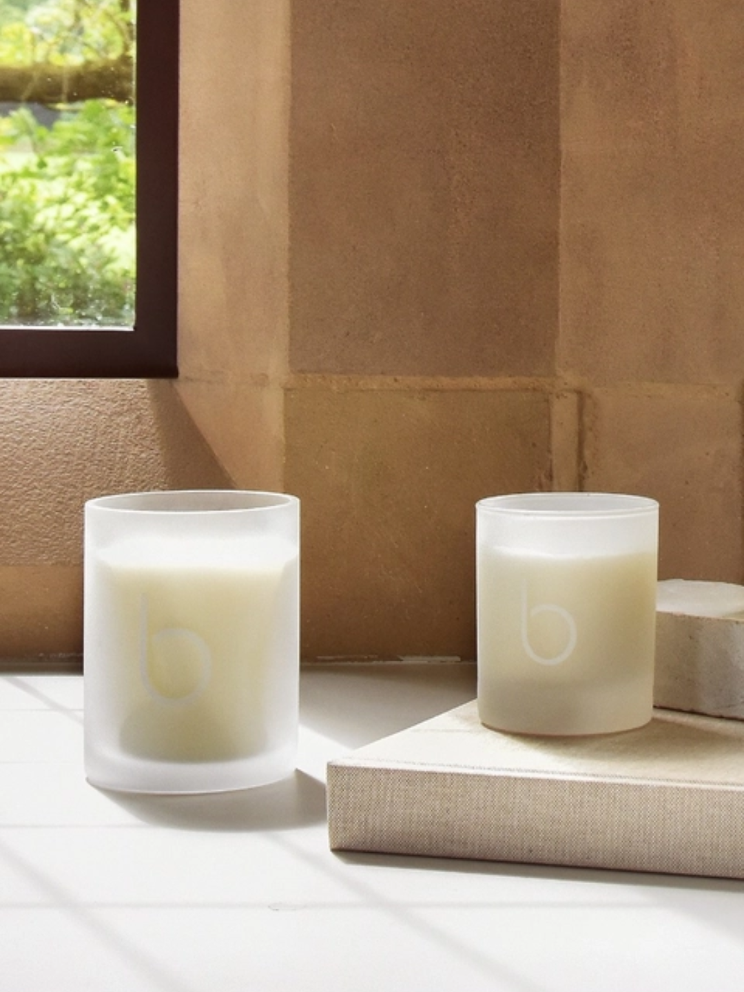 An image of two frankincense scented candles from Bamford