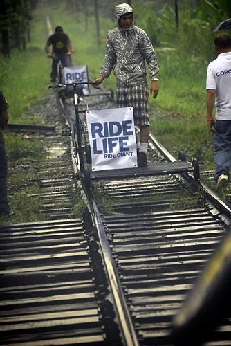 Giant sponsored these carts to cross racers over railroad bridges.