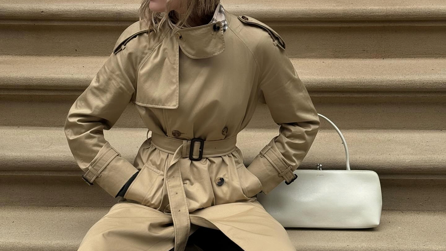 Christie Tyler in a Burberry trench coat.