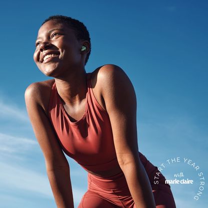 Cardio exercises: A woman smiling after a workout