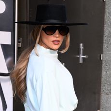 Jennifer Lopez wore a teal skirt set from Willy Chavarria Spring 2026 show, worn by Pamela Anderson in July