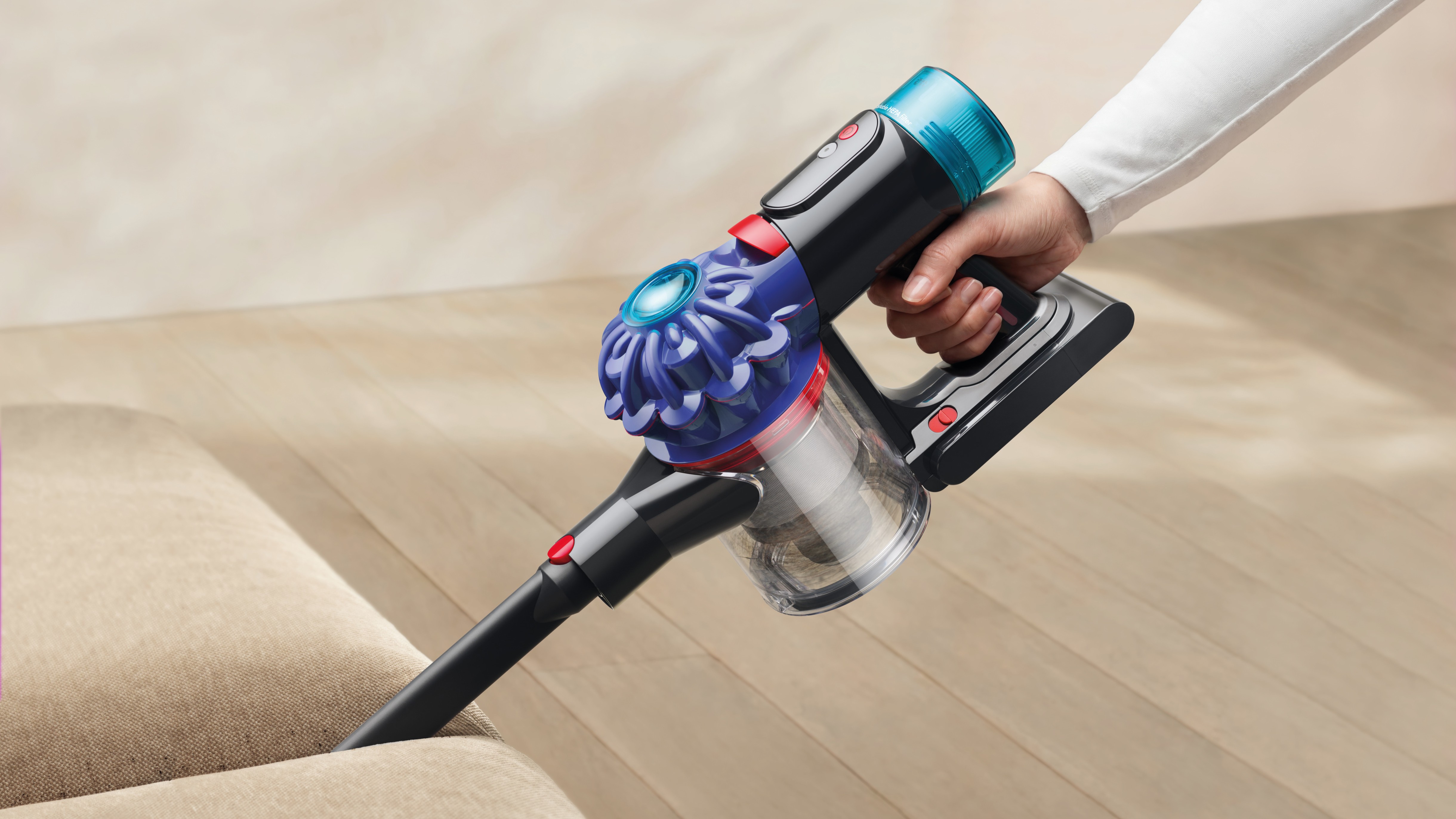 Dyson V10 Konical being used with crevice tool