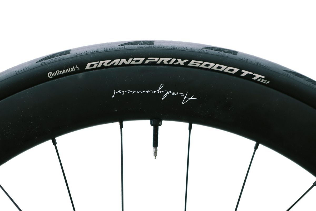 a close up of a black road bike tyre