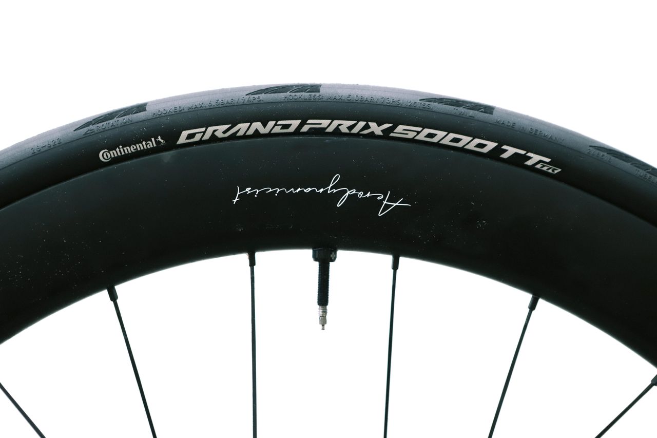 a close up of a black road bike tyre