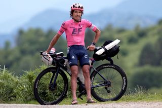 Australian cyclist Lachlan Morton poses as he takes a break at the ColdePort during the 13th day of his solo alternative Tour de France