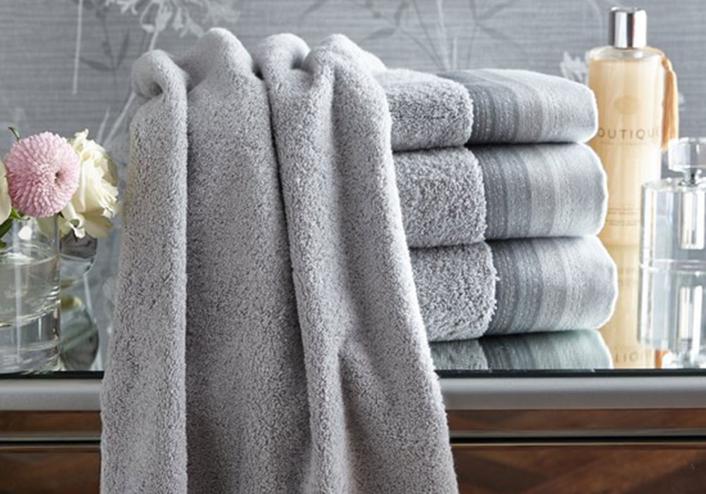room with towels on wooden table
