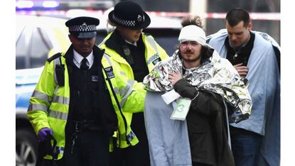 Police help wounded after Westminster attack