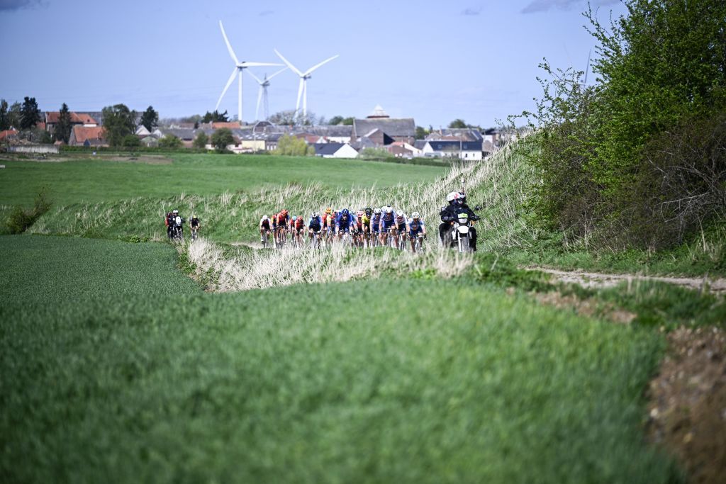 The pack of riders pictured in action during the men's elite race of the 'Paris-Roubaix' cycling event, 260,0km from Compiegne to Roubaix, France on Sunday 09 April 2023. BELGA PHOTO JASPER JACOBS (Photo by JASPER JACOBS / BELGA MAG / Belga via AFP)