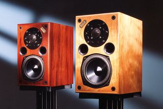 A pair of Acoustic Energy AE1 speakers on stands