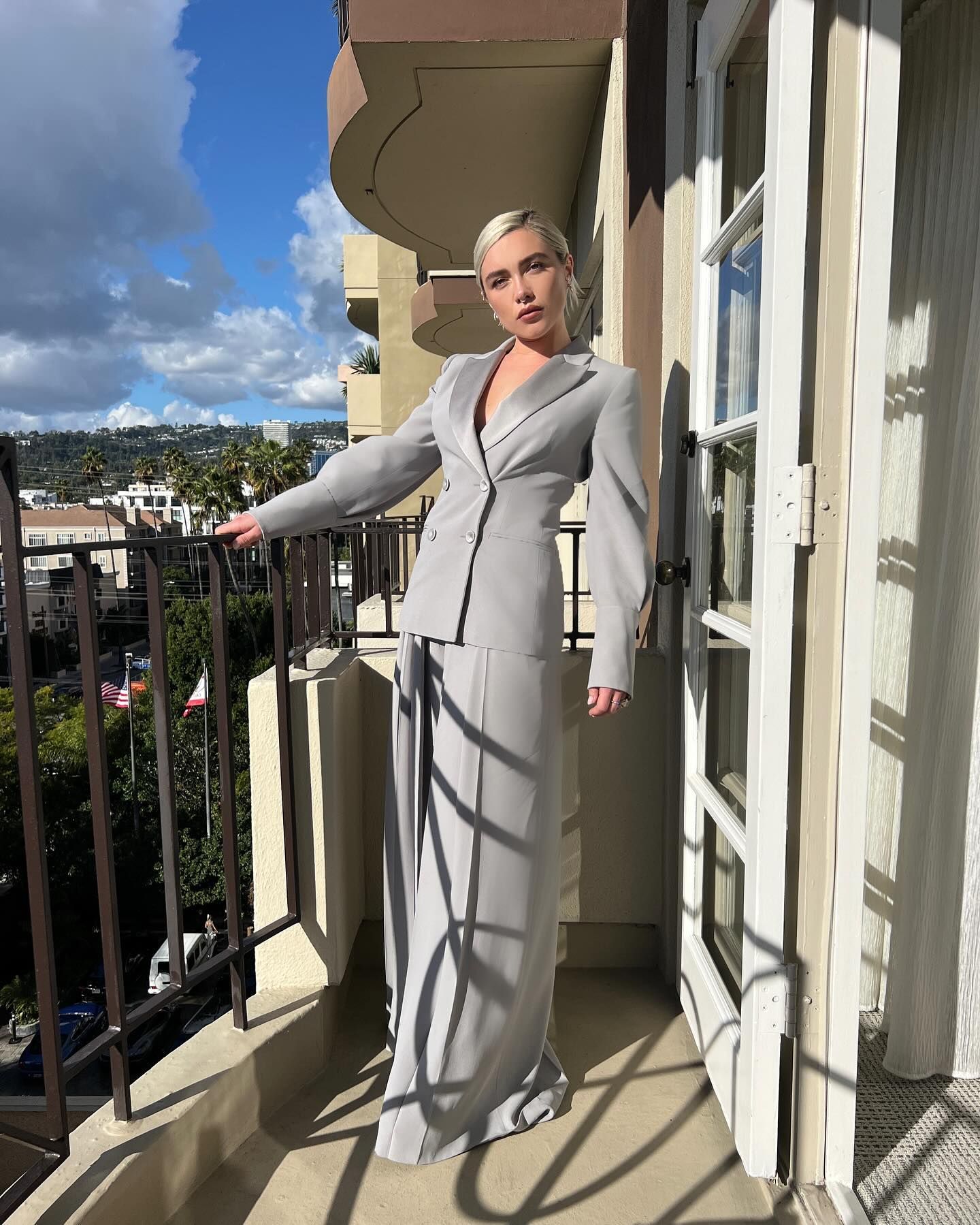 florence pugh wearing a pantsuit