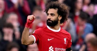 Liverpool forward Mohamed Salah celebrates after scoring the third goal during the Premier League match between Liverpool FC and Nottingham Forest at Anfield on October 29, 2023 in Liverpool, England.