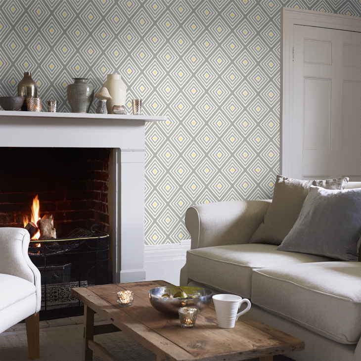 Grey and yellow diamond print wallpaper in a living room