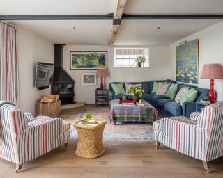 colorful country living room in 19th century Dorset barn conversion