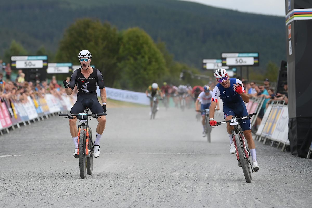 Picture by Alex Broadway/SWpix.com - 10/08/2023 - 2023 UCI Cycling World Championships - MTB Cross Country - Glentress Forest, Peebles, Scotland - Elite Men Cross-country Short Track - sam Gaze - New Zealand takes gold from Victor Koretzky of France