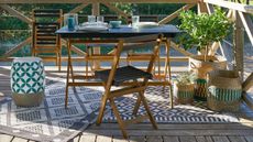 Myrton 5-Piece La Redoute Garden Furniture Set in garden on rug