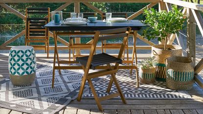 Myrton 5-Piece La Redoute Garden Furniture Set in garden on rug