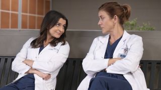 Amelia Shepherd (Caterina Scorsone) sits on a bench looking at Addison Montgomery (Kate Walsh) on Grey's Anatomy Season 22 "Strip That Down."