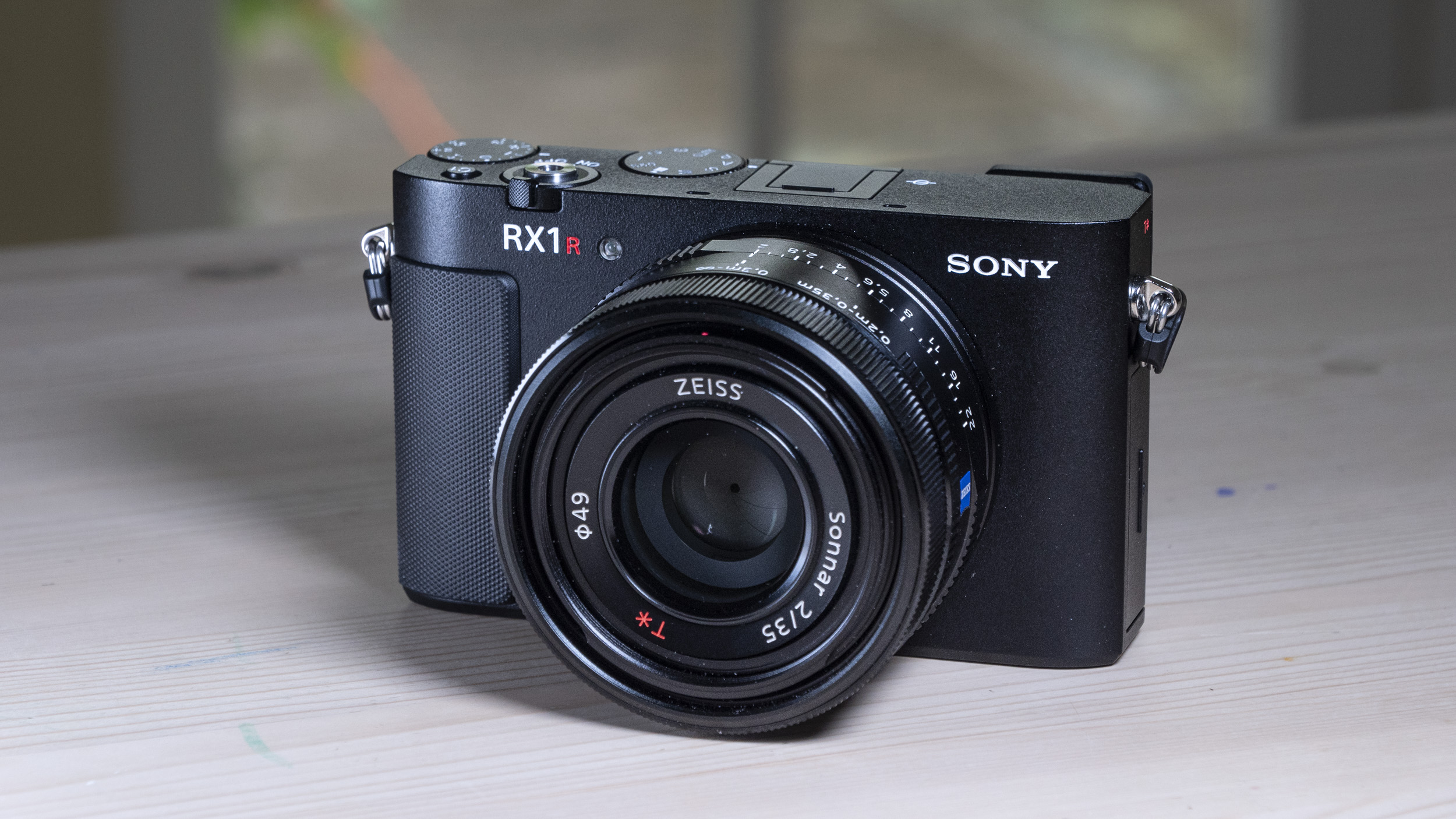 Sony RX1R III compact camera on a wooden table