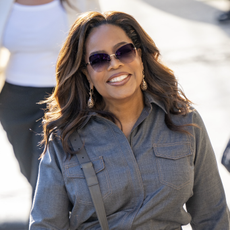 Oprah Winfrey is seen at "Jimmy Kimmel Live" on September 17, 2024 in Los Angeles, California wearing chloe sneakers and a denim jumpsuit